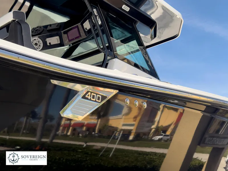 Slide: The Image of 2024 Blackfin 400 boat exterior with Sovereign Yachts logo. - 14
