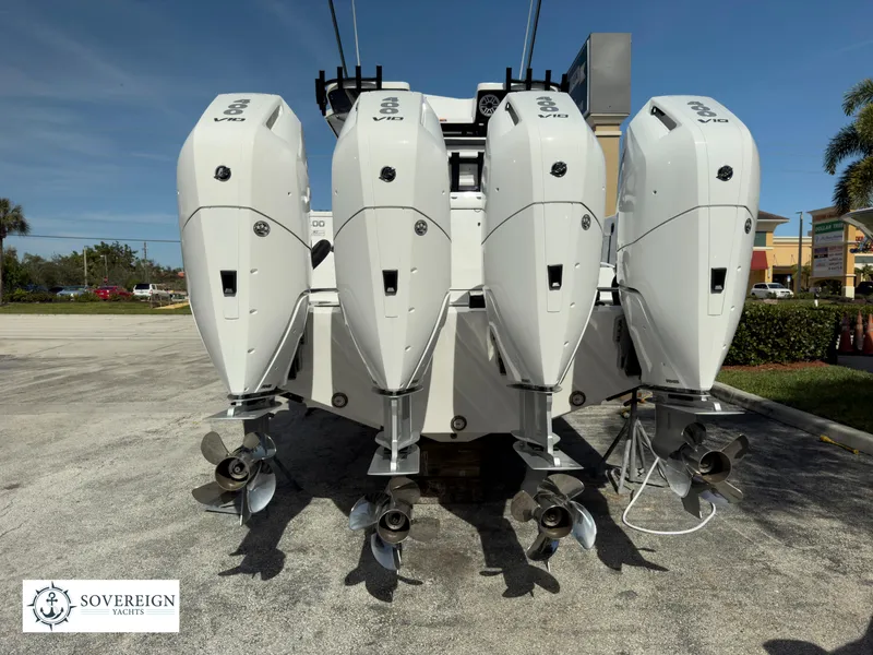 Slide: The Image of 2024 Blackfin 400 boat with quad outboard engines, Sovereign Yacht logo. - 15