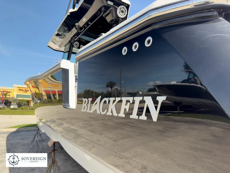 Slide: The Image of 2024 Blackfin 400 yacht exterior with Sovereign Yachts logo. - 16