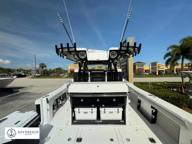 Slide: The Image of 2024 Blackfin 400 boat with fishing rod holders and storage, displayed at Sovereign Yachts. - 17