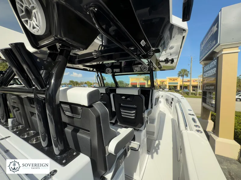 Slide: The Image of 2024 Blackfin 400 boat interior with seating and Sovereign Yachts logo. - 18