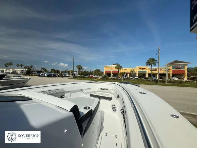Slide: The Image of 2024 Blackfin 400 boat displayed at Sovereign Yacht dealership. - 21