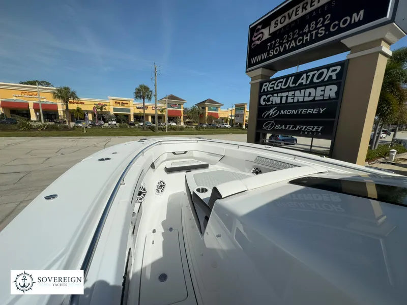Slide: The Image of 2024 Blackfin 400 boat displayed at Sovereign Yachts dealership. - 27