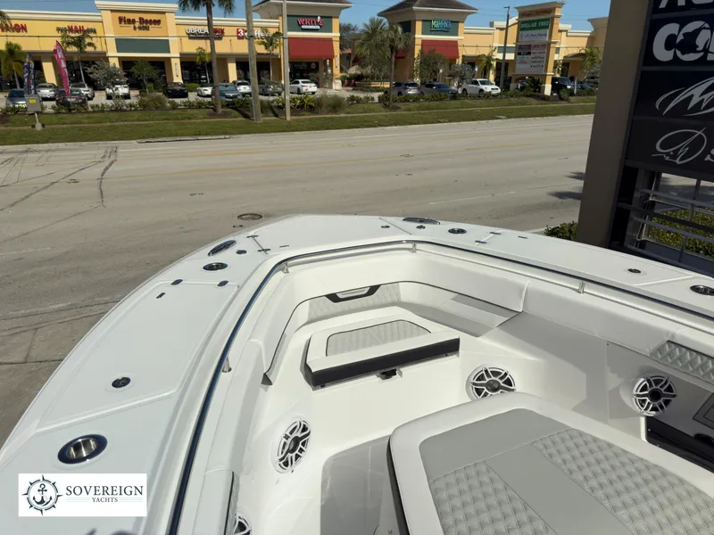 Slide: The Image of 2024 Blackfin 400 boat interior with seating and speakers, showcased by Sovereign Yachts. - 29