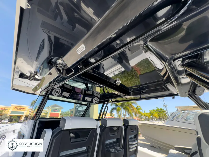 Slide: The Image of 2024 Blackfin 400 boat interior with advanced electronics and seating, showcased by Sovereign Yachts. - 33