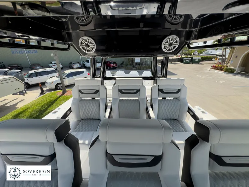 Slide: The Image of 2024 Blackfin 400 boat interior with luxurious seating and modern design. - 36