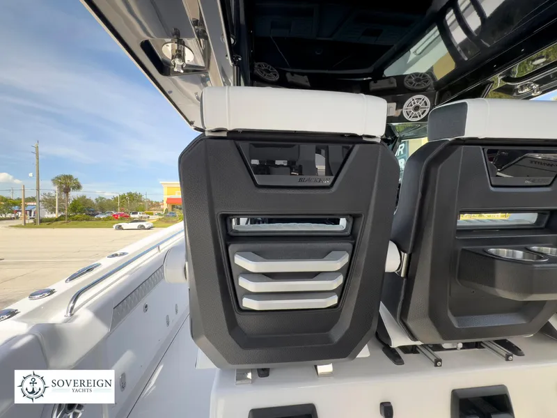 Slide: The Image of 2024 Blackfin 400 boat interior with Sovereign Yachts logo. - 38