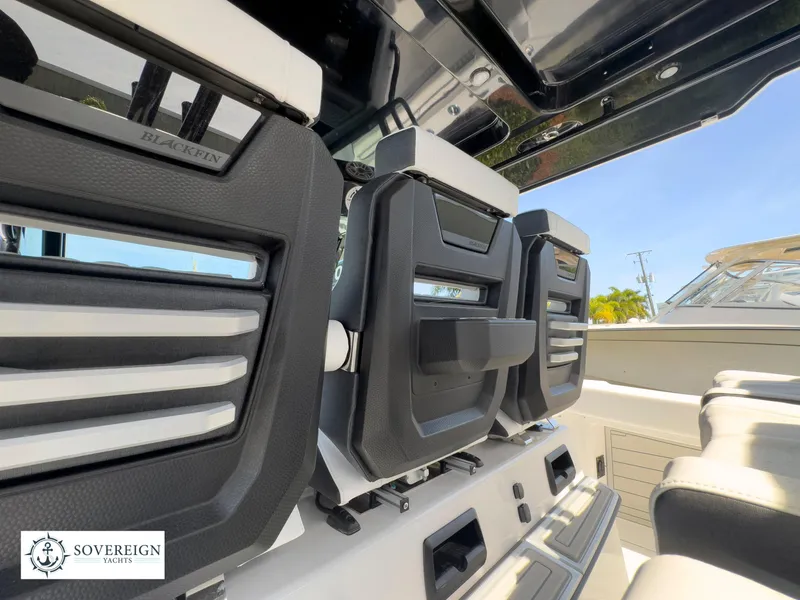 Slide: The Image of 2024 Blackfin 400 boat interior with modern seating and Sovereign Yachts logo. - 39