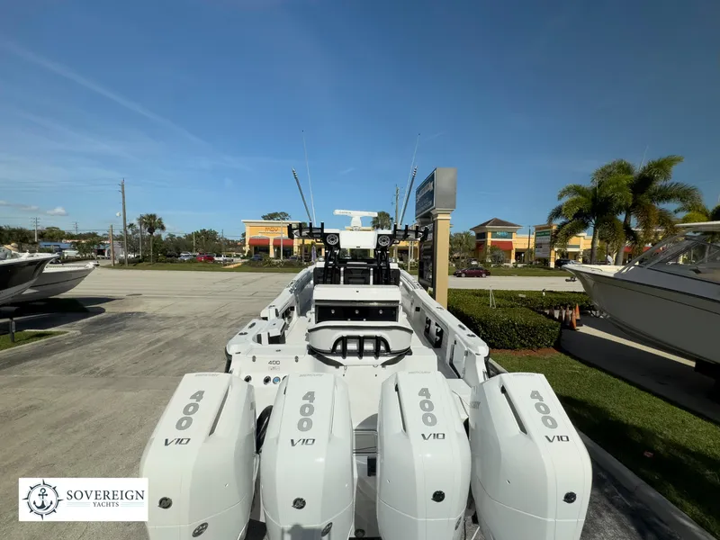 Slide: The Image of 2024 Blackfin 400 boat with multiple V10 engines at Sovereign Yacht dealership. - 5