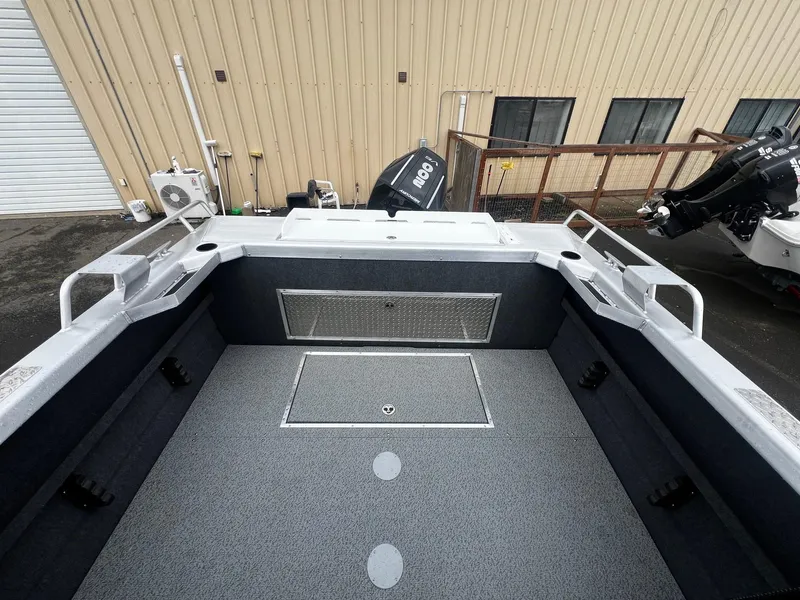 Slide: The Image of 2024 Thunder Jet 21 Chinook OS boat interior with spacious deck and storage compartments. - 14