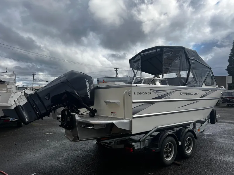 Slide: The Image of 2024 Thunder Jet 21 Chinook OS boat with outboard motor on trailer. - 4