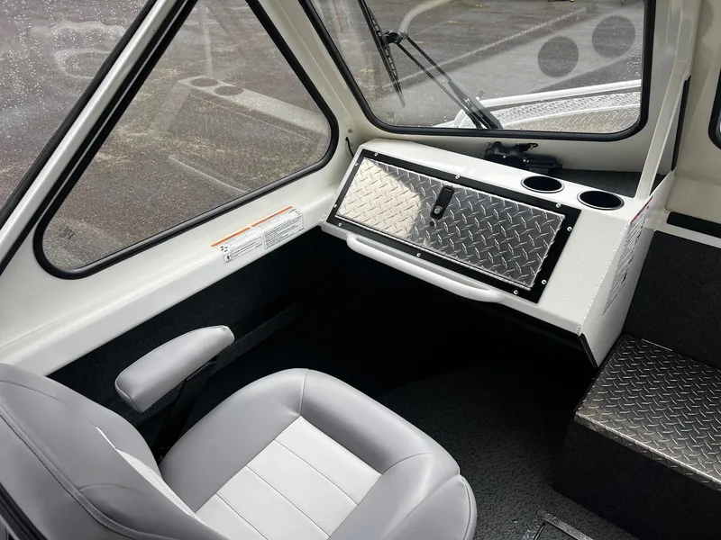 Slide: The Image of Interior of 2024 Thunder Jet 21 Chinook OS boat with seating and storage. - 9