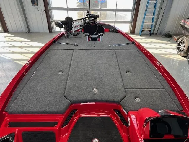 Slide: The Image of 2024 iKon LX20 fishing boat with spacious deck and modern equipment in a garage. - 10