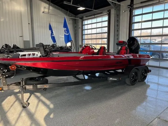 Slide: The Image of 2024 iKon LX20 red fishing boat on trailer in showroom. - 4