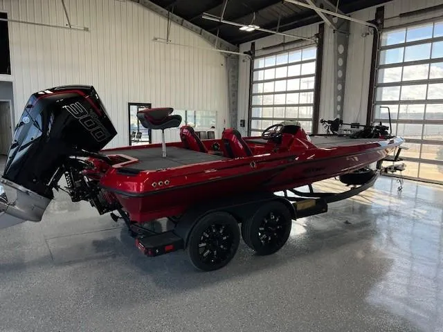 Slide: The Image of 2024 iKon LX20 red fishing boat with 300 HP engine in showroom. - 7