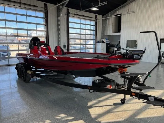 Slide: The Image of 2024 iKon LX20 red fishing boat on trailer in showroom. - 8