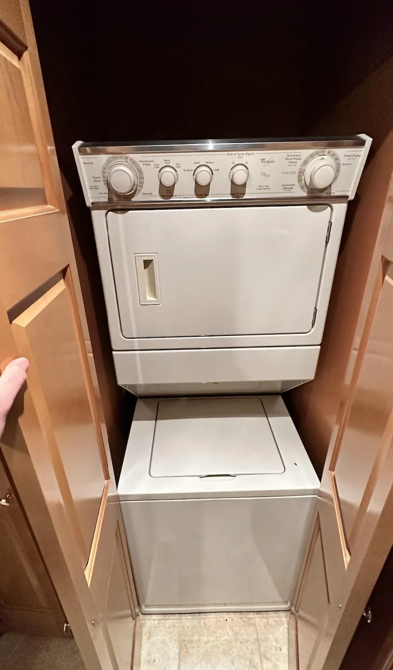 Slide: The Image of Stacked washer and dryer unit in wooden closet, Fantasy 18 x 80 model, 2005. - 15