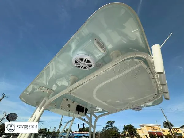Slide: The Image of 2024 Sailfish 242 CC boat canopy with speakers and equipment, showcased by Sovereign Yacht. - 19