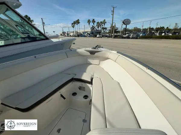 Slide: The Image of 2024 Sailfish 242 CC boat interior with spacious seating and modern design. - 30