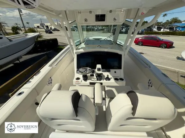 Slide: The Image of 2024 Sailfish 312 boat interior with dual seats and modern dashboard controls. - 20