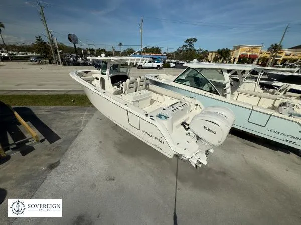Slide: The Image of 2024 Sailfish 312 boat with Yamaha engine displayed at Sovereign Yachts dealership. - 4