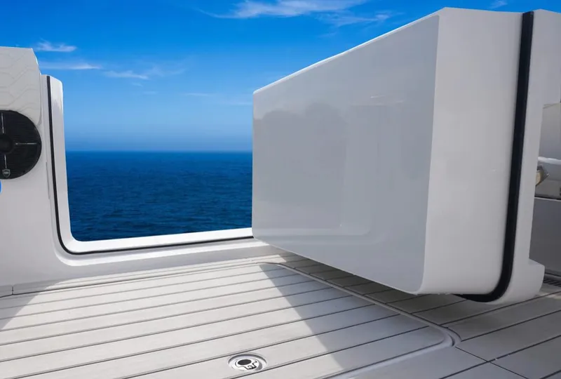 Slide: The Image of Twin Vee 400 GFX 2025 boat deck with ocean view and blue sky. - 9