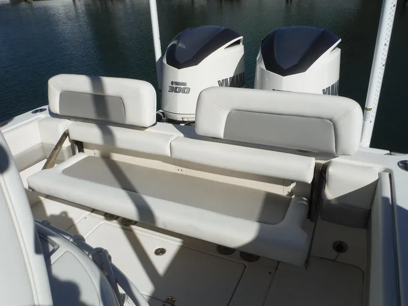 Slide: The Image of 2020 Blackwood 270 Open Center Console boat with Yamaha engines and cushioned seating. - 13