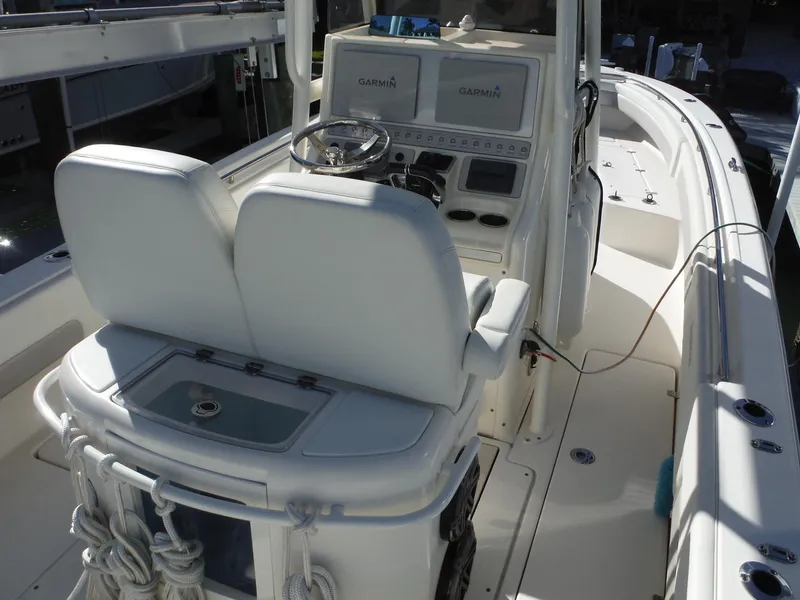 Slide: The Image of 2020 Blackwood 270 Open Center Console boat interior with dual Garmin displays. - 17