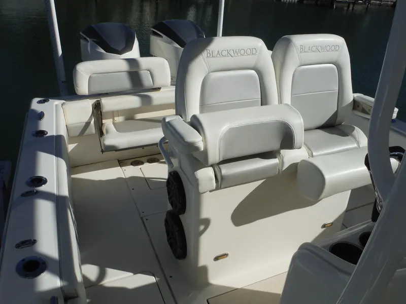 Slide: The Image of 2020 Blackwood 270 Open Center Console boat interior with cushioned seating. - 22