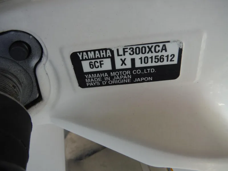 Slide: The Image of Yamaha LF300XCA engine label on a 2020 Blackwood 270 Open Center Console boat. - 25