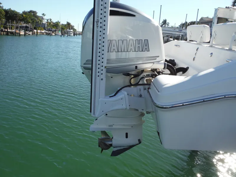 Slide: The Image of 2020 Blackwood 270 Open Center Console with Yamaha outboard motor in marina. - 28