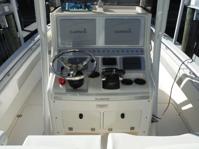 Slide: The Image of 2020 Blackwood 270 Open Center Console boat helm with Garmin navigation system. - 29