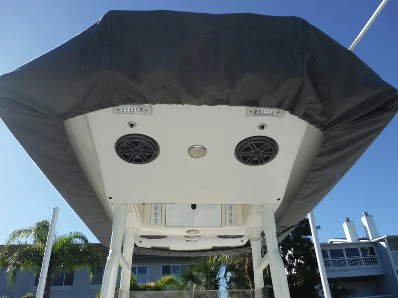 Slide: The Image of 2020 Blackwood 270 Open Center Console boat with covered T-top and speakers. - 30