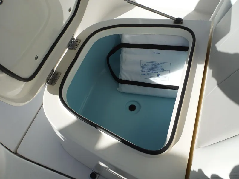 Slide: The Image of Open storage compartment on a 2020 Blackwood 270 Open Center Console boat. - 33