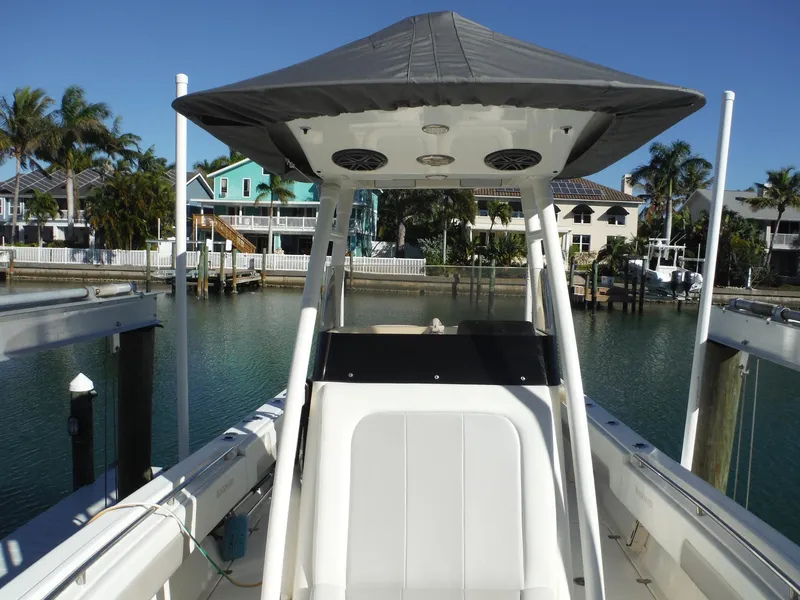Slide: The Image of 2020 Blackwood 270 Open Center Console boat docked in a scenic marina. - 35