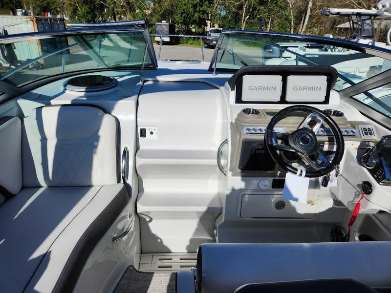 Slide: The Image of Interior cockpit of 2024 Crownline 280 CRX boat with Garmin navigation system. - 4