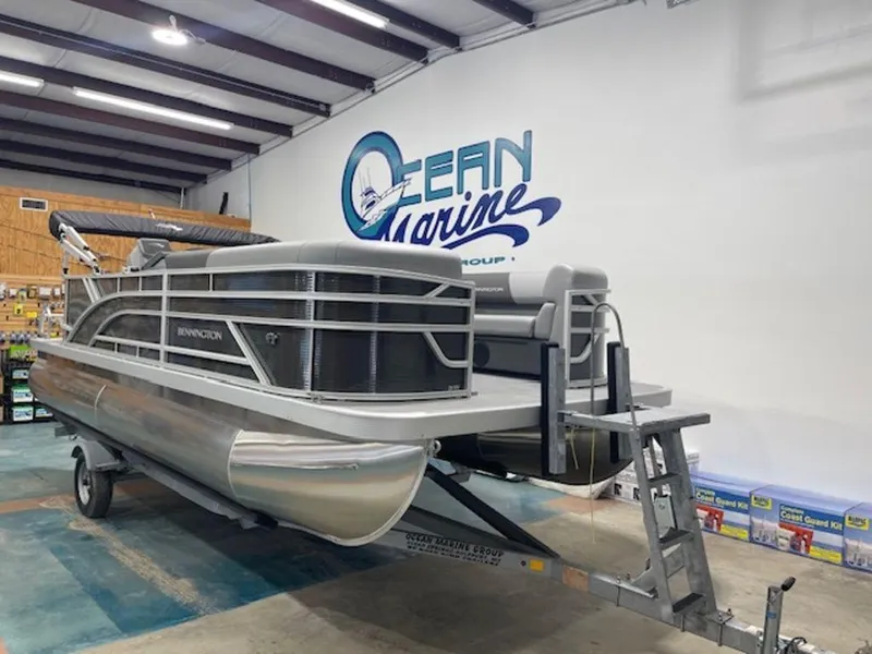 Slide: The Image of 2024 Bennington 20 SVL pontoon boat displayed indoors at Ocean Marine. - 8