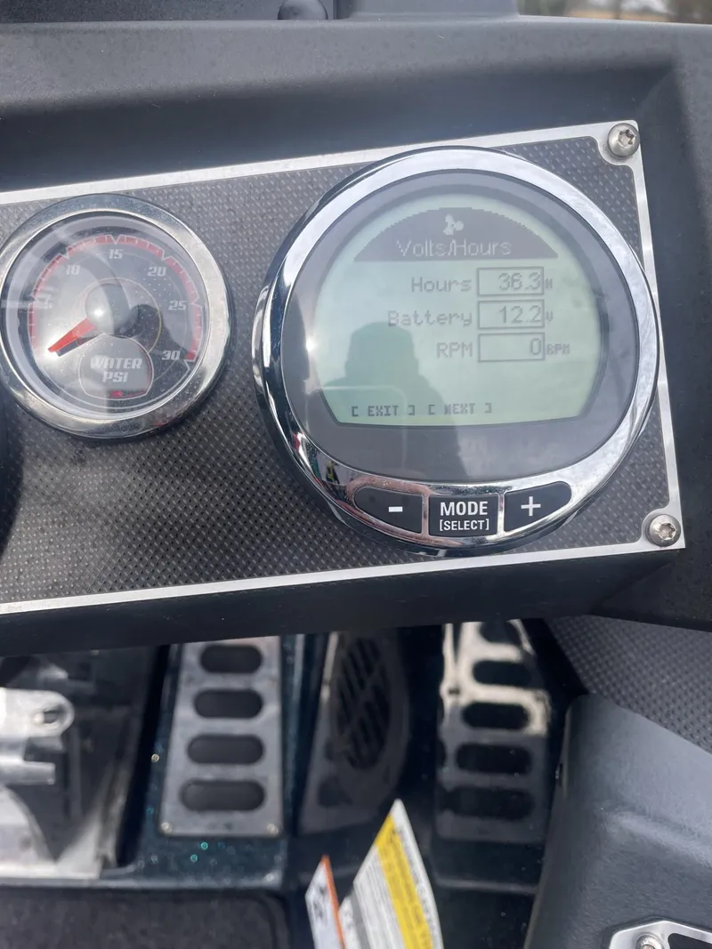 Slide: The Image of 2021 Ranger Z521L dashboard with digital and analog gauges. - 7