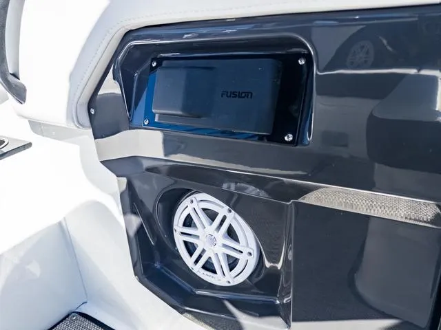 Slide: The Image of 2024 Monterey 258 SS boat interior with Fusion audio system and speaker. - 17