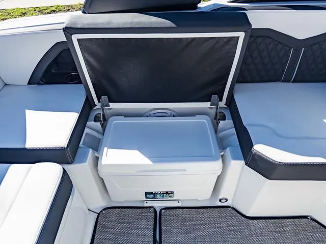 Slide: The Image of 2024 Monterey 258 SS boat interior with open storage compartment. - 21