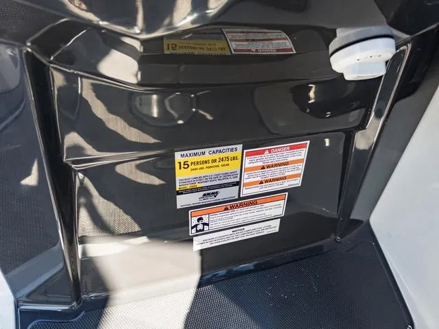 Slide: The Image of 2024 Monterey 258 SS boat capacity and warning labels. - 29