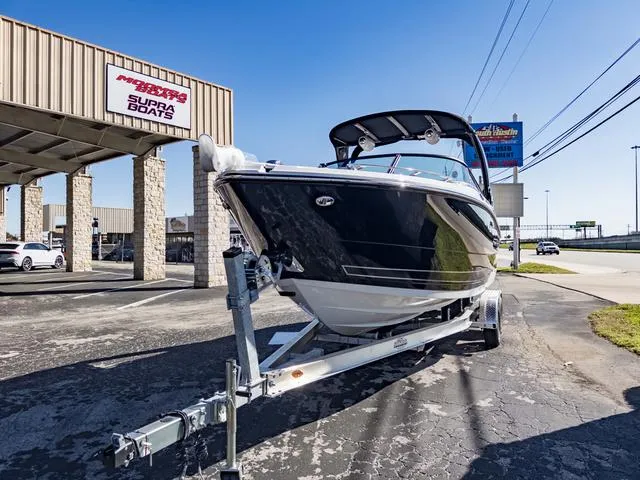 Slide: The Image of 2024 Monterey 258 SS boat on trailer at dealership. - 3