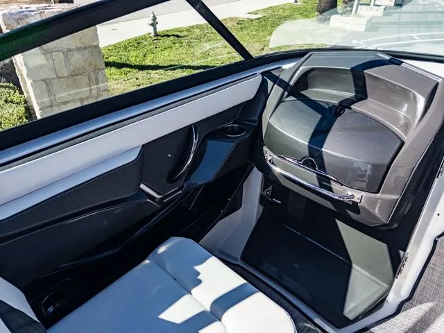 Slide: The Image of Interior of 2024 Monterey 258 SS boat with modern seating and sleek design. - 31