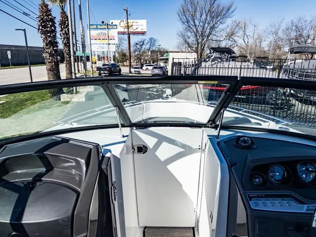 Slide: The Image of 2024 Monterey 258 SS boat dashboard and cockpit view. - 34