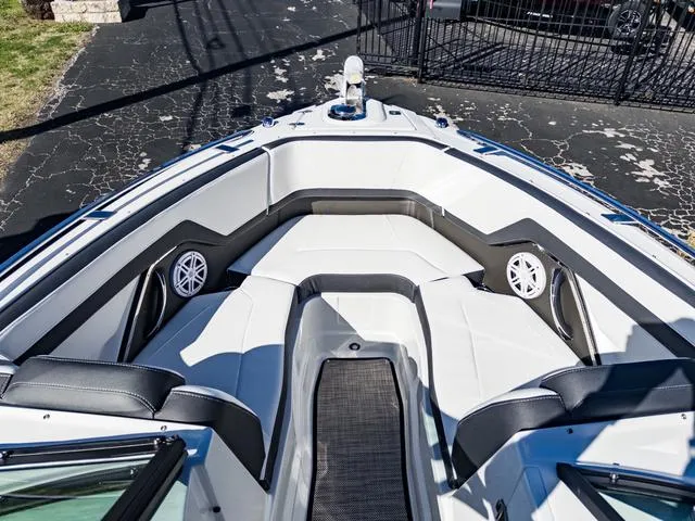 Slide: The Image of 2024 Monterey 258 SS boat interior with white and black seating. - 36