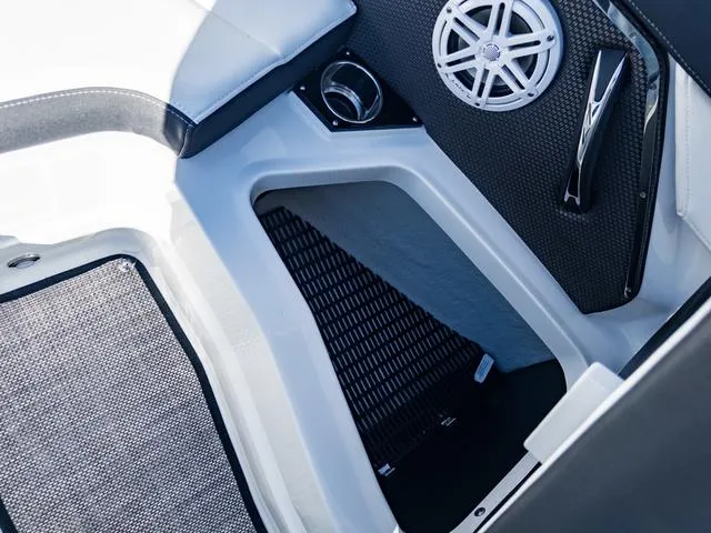 Slide: The Image of 2024 Monterey 258 SS boat interior with speaker and seating area. - 38