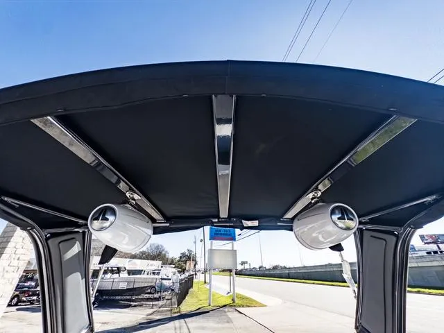 Slide: The Image of 2024 Monterey 258 SS boat canopy with mounted speakers. - 42