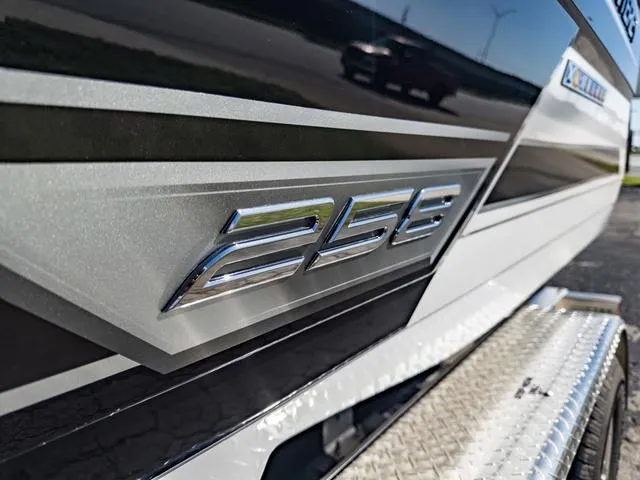 Slide: The Image of Close-up of 2024 Monterey 258 SS boat emblem on sleek exterior. - 5