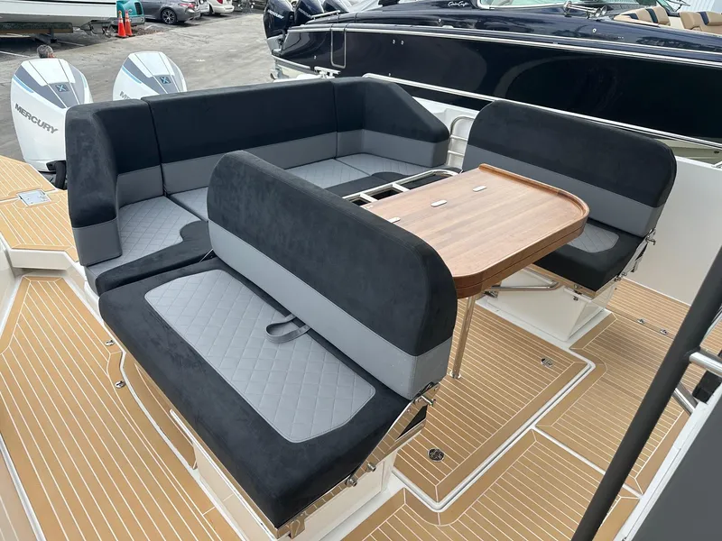 Slide: The Image of Luxurious seating area on the 2024 Nimbus Tender 11 #258 boat. - 12