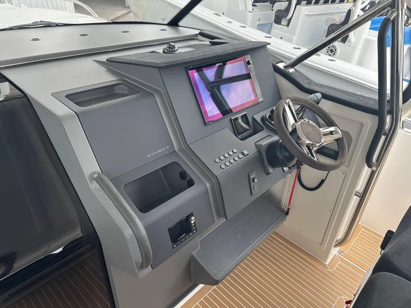 Slide: The Image of Control panel of 2024 Nimbus Tender 11 #258 with steering wheel and touchscreen display. - 17